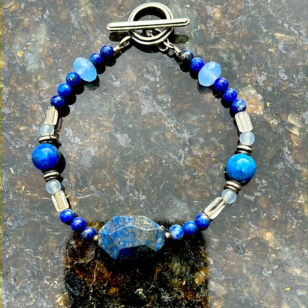 Polished and faceted stone bracelet with 925 silver